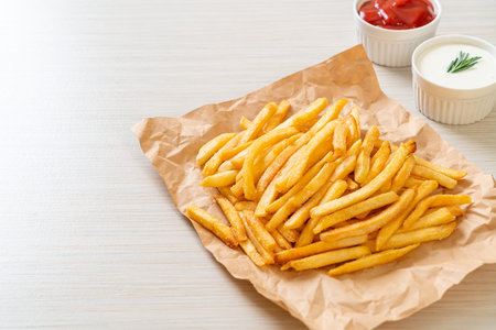 French fries with sour cream and ketchup