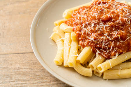 rigatoni pasta with pork bolognese sauceの写真素材