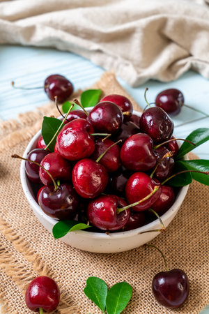 Fresh cherries in bowl
