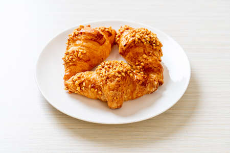 fresh croissant with peanutの写真素材