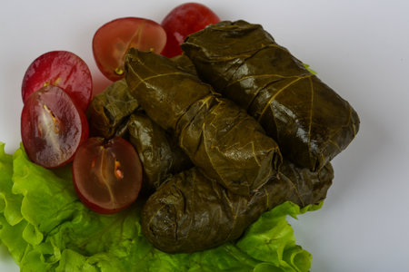 Dolma - minced meat in grape leaves with saladの素材