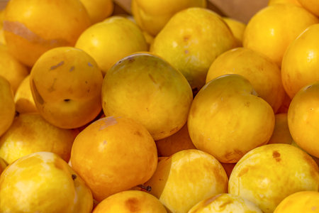 plum,local organic fruit in a street marketの素材