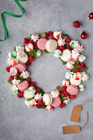 Christmas dessert idea, macarons wreath with meringues and raspberryの素材