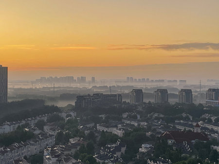 Sunrise over the city of Beijing China. View from the top of the building.の写真素材