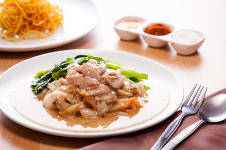 Friend noodle with pork and kale in gravyの写真素材