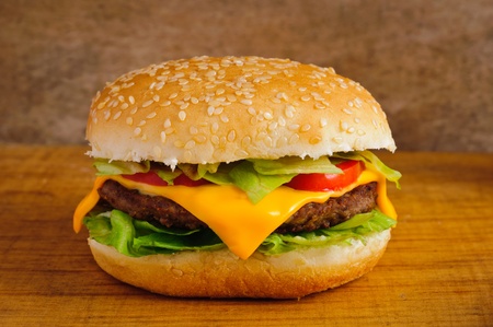 Hamburger or cheeseburger closeup on a wooden backgroundの写真素材