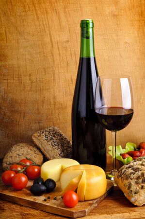 still life with traditional food and red wineの写真素材