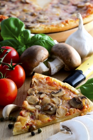 delicous fresh italian mushroom pizza and ingrdientsの写真素材