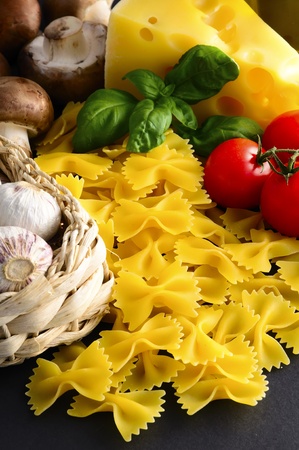 still life with italian farfalle pasta ingredientsの写真素材