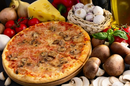 traditional homemade italian pizza and ingredientsの写真素材