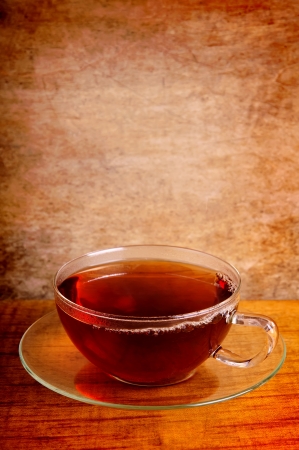 cup of tea on a vintage grunge wooden background with copy spaceの写真素材