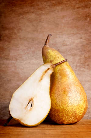 pears on a wooden vintage backgroundの写真素材