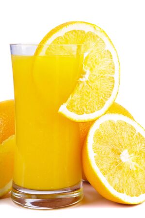 oranges and glass of orange juice isolated on a white backgroundの写真素材