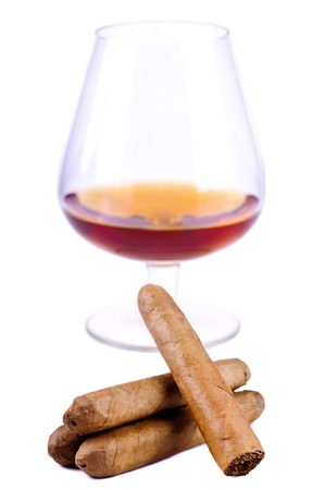 cigars and glass of cognac isolated on a white backgroundの写真素材