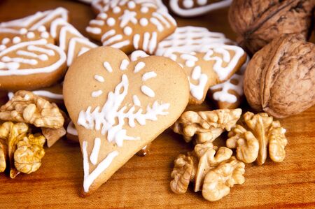 heart shaped ginger bread and wallnutsの写真素材