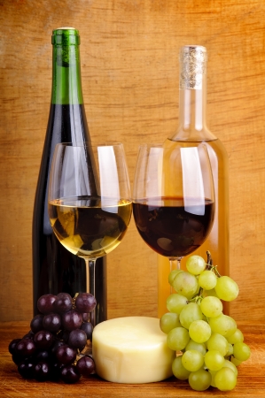 still life with wine, cheese and grapesの写真素材