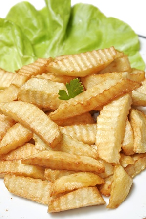 home made french fries on white plateの写真素材
