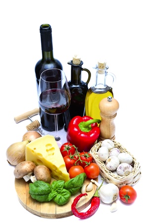 healthy food ingredients and red wine isolated on a white backgroundの写真素材