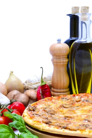 traditional pizza with ingredients and text copy space on a white backgroundの写真素材