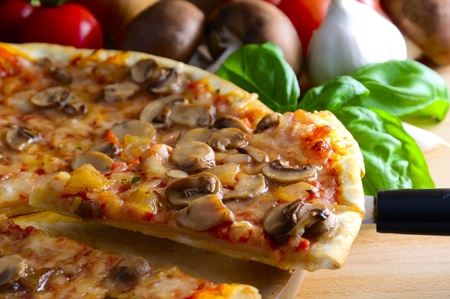 slice of traditional homemade italian pizzaの写真素材