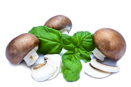 mushrooms and basil isolated on a white backgroundの写真素材