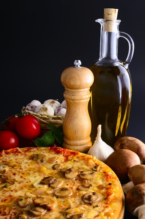 still life with traditional pizza and ingredientsの写真素材