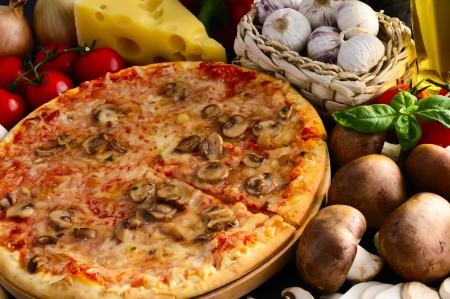 still life with mushroom pizza and ingredientsの写真素材