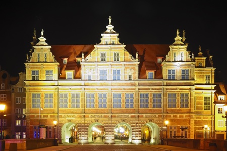 green gate in danzig, poland, at nightのeditorial素材