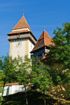 fortified saxon church in apold (trapold), transylvania, romaniaの写真素材