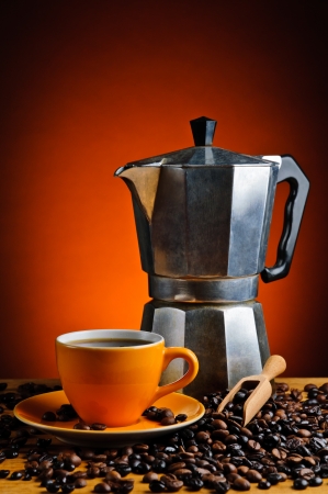 still life with fresh espresso coffee cup, pot and beansの写真素材