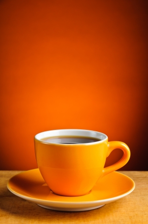 still life with orange espresso coffee cupの写真素材
