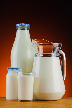 still life with fresh organic milk on a wooden tableの写真素材