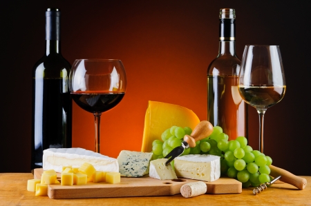 still life with cheese, wine and grapesの写真素材