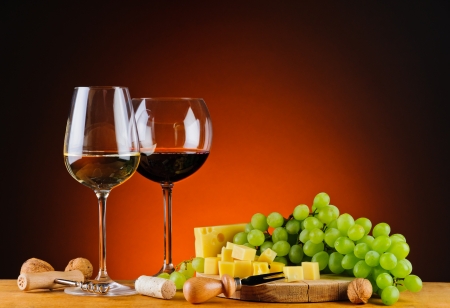 still life with cheese, wine and grapesの写真素材