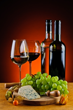still life with cheese, wine and grapesの写真素材