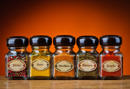 still life with various spices in bottlesの写真素材