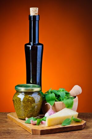 still life with basil pesto and ingredientsの写真素材