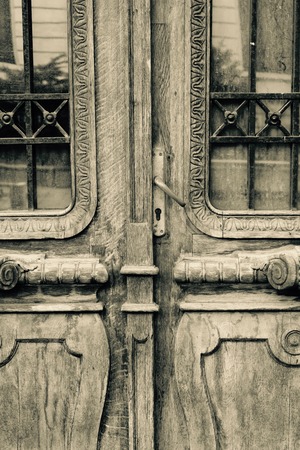 Close up photo of an old wood or wooden door with metal ironの写真素材