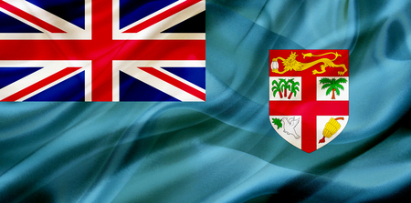 Fiji country flag symbol on silk or silky waving texture. Smooth fabric or materialの写真素材