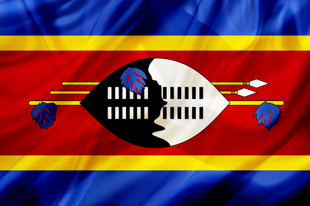 Swaziland country flag symbol on silk or silky waving texture. Smooth fabric or materialの写真素材