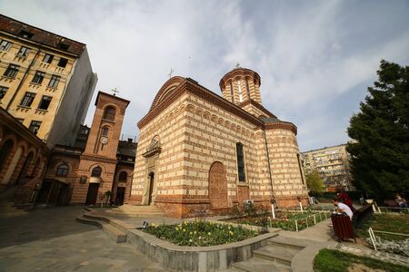 Bucharest, Romania - January 1, 2020: Classic Medieval Christian Orthodox church show on ultra vide angle view from one of its corners in Bucharest Romania. Old Center, Lipscani streetのeditorial素材