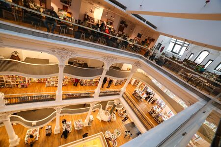 Bucharest, Romania - January 1, 2020: Inside view of the beautiful Carturesti Public Library shot on a ultra wide angle on Lipscani street, Old Center, Bucharest Romaniaのeditorial素材