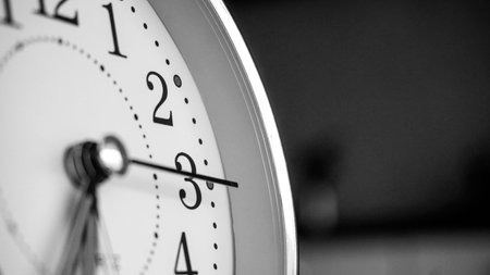 Black white big metallic clock close up. Time or showing time concept. Classic retro mechanical...