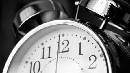 Black white big metallic clock close up. Time or showing time concept. Classic retro mechanical...