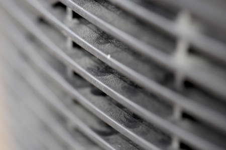 Dusty car radiator grill pattern background in black and whiteの写真素材