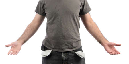 A broke man with empty pockets, isolated on a white background の写真素材