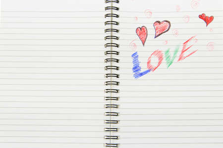 Pen drawing love doodle in a notebookの写真素材