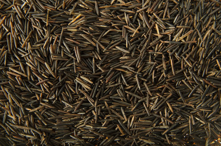 A background image of wild rice grains