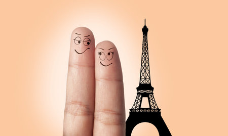 A finger couple dream to travel to Paris Franceの写真素材