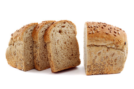 Wholemeal bread with seeds isolated on white. Studio shot.
